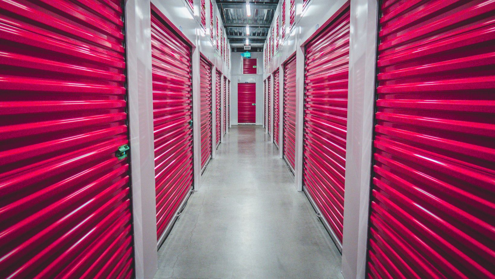 Hallway with red storage units